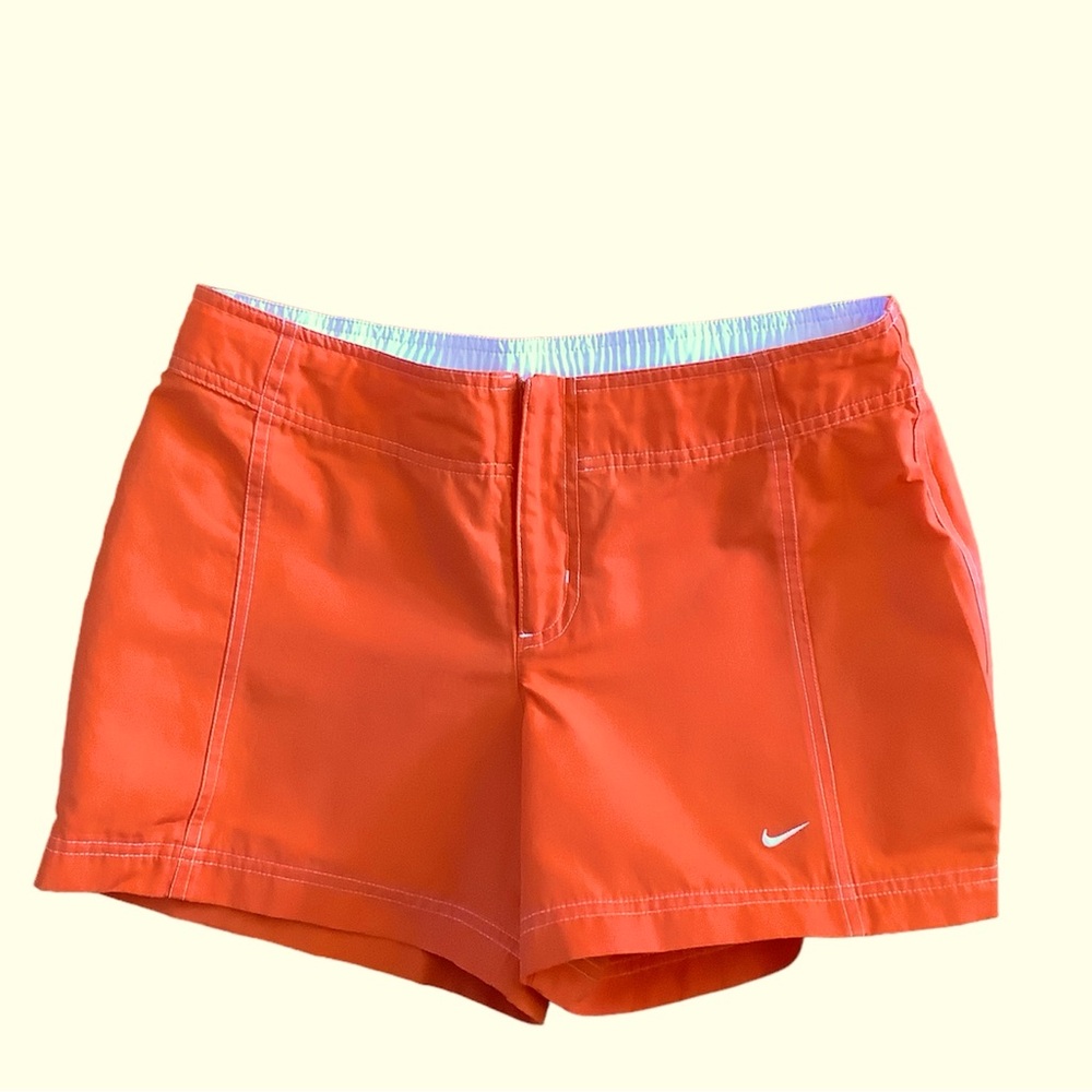 Orange Nike shorts. White topstitching. Sz. S. Excellent condition
